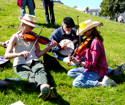 Fiddlers for Peace met 3-20-04 in Dolores Park to stop the war by playing Soldier's Joy and Whiskey Before Breakfast.
